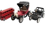 three toy cars that are sitting next to each other