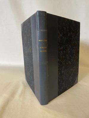 three books are stacked on top of each other on a white surface