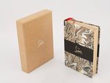 a box that has a book in it and a box that has a book inside of it