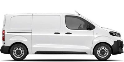 la camionnette blanche est garée sur le côté de la route