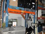 many boxes stacked on the shelves in the garage