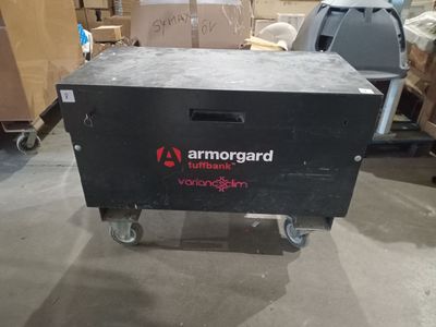 an image of a black box sitting on top of a cart