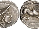 a silver coin with an image of a woman and a horse on it