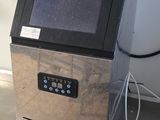 an image of a machine that is sitting on a counter
