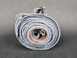 a close up of a roll of fabric on a table