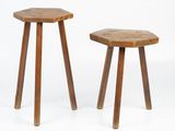 two small wooden stools with legs and a wooden top