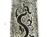 an image of a stone with a dragon on it