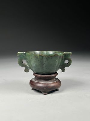 pair of green jade cups with carved handles