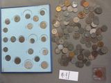 a lot of coins that are on display on the table