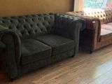 a couch and a chair in a living room