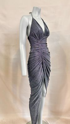 the mannequin is wearing a gray dress with a halt