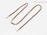 brown braided leather dog leash with brass plated clasp