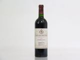 a bottle of wine that is sitting on a table