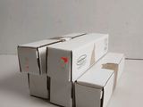several white boxes stacked on top of each other on a white surface