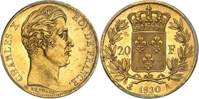 a gold sovereign coin with a crown on top of it