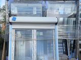 a lot of windows that have been wrapped in plastic