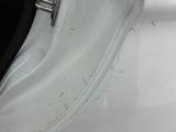 a close up of a car door handle with rust on it