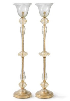 pair of gold and clear glass candlesticks