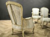 three chairs that are sitting on a wooden floor