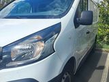 a white van parked on the side of the road