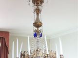 a chandelier that is hanging from the ceiling