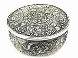 an image of a silver box sitting on top of a white surface
