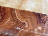 a close up of a table with a marble top