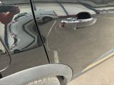 a reflection of a car in the side mirror of a car