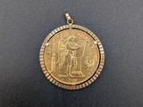 a gold coin with an image of a man and a woman on it