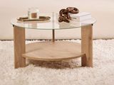 a coffee table with a glass top in a living room