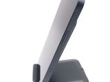 a cell phone that is sitting on top of a stand