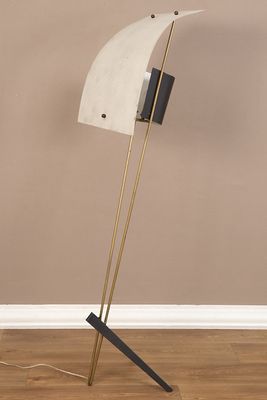 an image of a floor lamp that is on a wooden floor