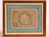 an old map of the city of london in a wooden frame