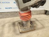 a close up of a vehicle ' s shock absorbor on the ground