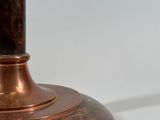 an image of a close up of a candle holder on a table