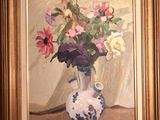 une peinture de fleurs dans un vase sur une table