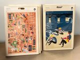 two bags that are sitting on a table
