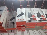 several boxes of different types of electronic devices on display in a store