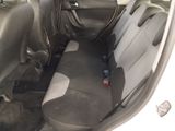 the interior of a car with two seats and a steering wheel