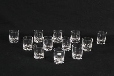 a group of glasses sitting on top of a black table