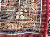a close up of a rug with fringes on it