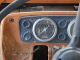 a close up view of the dashboard of an old truck