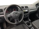 the interior of a car with a steering wheel and dashboard controls