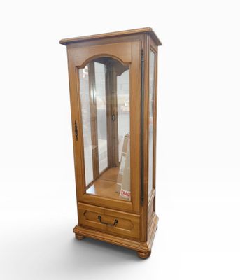 an image of a wooden display cabinet with a glass door