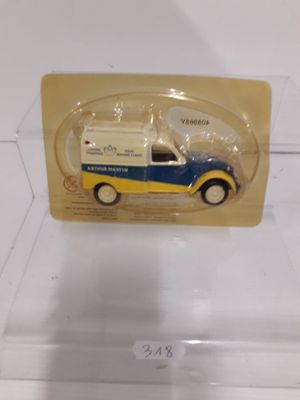 a toy truck that is in a clear box