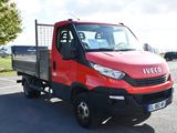 a red truck that is parked in a parking lot