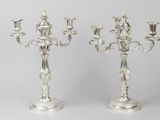 pair of silver plated candelabs on stands