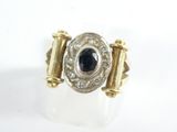 une image représentant une bague en or et en argent sertie d'un saphir