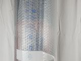a roll of bubble wrap sitting on top of a table