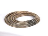 bracelets made of brass and silver metal with a knot on each end